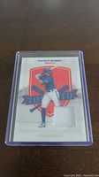 Front of the Bo Bichette baseball card showing image, jersey piece, and design