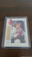 Front of Joe Thornton rookie card showing portrait and maple leaf design