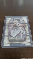 Front of Josh Allen Panini Select trading card showing action photo and team name