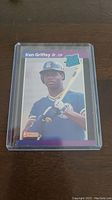 Front view of Ken Griffey Jr. 1989 Donruss Rated Rookie baseball card in protective sleeve, showing player image and card design.