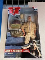 Full boxed GI Joe John F Kennedy PT 109 Boat Commander action figure showing packaging and contents.