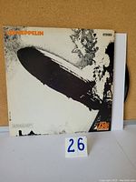 Front cover of Led Zeppelin vinyl LP album showing classic blimp image and logo.
