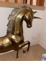 Side view showing unicorn head and upper body