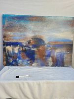 Abstract art canvas painting showing color composition and texture.