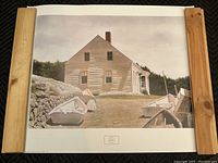 Full view of the art print showing the house and clam dory boats with wooden framing on the sides