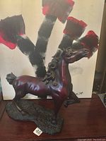 Front angle of the horse statue showing rearing pose and base texture