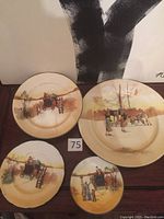 Set of four vintage Royal Doulton plates with pastoral/historical scenes in earthy tones.