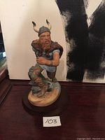 Full side view of Royal Doulton Viking figurine showing stance, base, and details.
