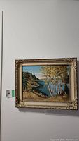 Frontal image of the signed acrylic painting showing the entire artwork and ornately detailed frame.