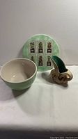 Mela-Ware hot plate with herb decor, Mayfair & Jackson mixing bowl and Scented Pine Pottery pitcher together.