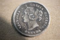 Obverse side of 1901 Canadian 5 cent coin showing Queen Victoria's profile and inscriptions.