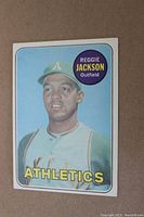 Front of 1969 Topps Reggie Jackson rookie card showing player image and team.