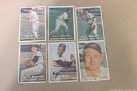 Full set of 6 Topps Baltimore Orioles baseball cards from 1957, showing the front of each card with player images and text.