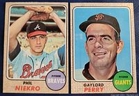 Front side images of 1968 Topps Phil Niekro and Gaylord Perry baseball cards showing player photos and team logos.