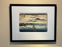 Full view of framed print on wall