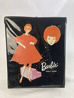 Closed black vinyl case with front artwork and Barbie logo