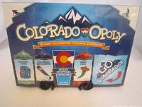 Front view of Colorado-opoly board game box with colorful graphics and Colorado themed properties.