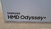 Close-up of the Samsung HMD Odyssey+ box showing model branding.