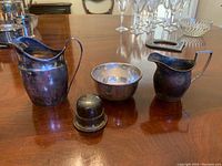 All items together: two creamers, bowl and ring case