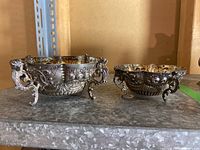Both silver bowls side by side, front view