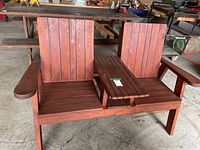 Front view of cedar bench showing two seats and center shelf