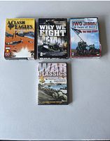 Four DVD documentary sets laid out flat on a white surface. Included are Why We Fight, Iwo Jima 36 Days of Hell, A Clash of Eagles, and War Classics.