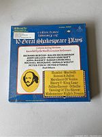 Blue box set of 10 Shakespeare plays sealed in plastic showing title and list of featured plays and actors.