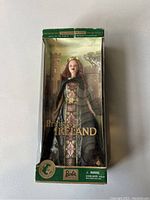 Front view of the boxed Princess of Ireland Barbie doll showing the detailed dress and crown, along with the worn condition of the box.