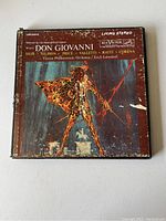 Photo of the front of the record box showing the cover art for Mozart's Don Giovanni and listing performers and orchestra.