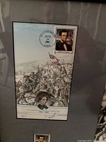 Framed commemorative Civil War art piece showing a battle scene with a Jefferson Davis stamp and postmark dated June 29, 1995, signed and numbered.