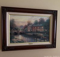 Full front view of framed Thomas Kinkade print showing frame, mat, fillet and image