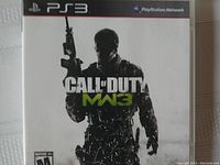 Front cover of Call of Duty MW3 PS3 game case showing the game artwork with soldier silhouette and game title.
