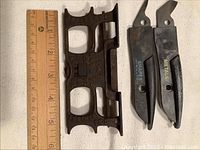 Photo showing the metal crosscut saw jointer alongside a ruler for scale indicating approximately 5 inches in length.