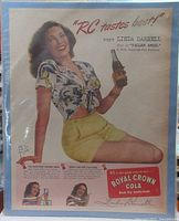 Full view of Linda Darnell Royal Crown Cola magazine advertisement holding a bottle with promotional text.