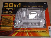 Front of box showing 38 in 1 Wii Accessories Party Pack with list of included items, compatible with Nintendo Wii