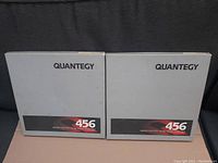 Closed view of two Quantegy 456 boxes with branded labels visible.