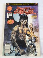 Photo of Bruce Lee comic book cover featuring muscular Bruce Lee and a woman on motorcycle. Issue #1 with exclusive Mortal Kombat preview, giant step size first print.