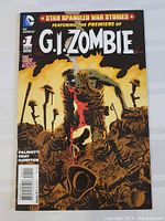 Front cover photo of G.I. Zombie Comic Book issue #1 showing the zombie soldier in battlefield setting.