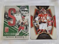Two Patrick Mahomes II football cards side by side, showing front faces and designs.