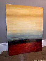 Full angled view of the painting showing colors and signature.