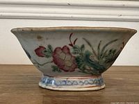 Side view showing red and yellow floral motif