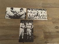 Top view of three vintage black and white postcards featuring Babe Ruth and other baseball players.