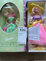 Simply Charming Barbie doll in green floral dress in original box with visible packaging text and floral border