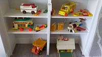 Various childrens pull toys displayed on shelves including vehicles, airplane, and play accessories.