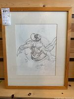 Full view of framed pencil sketch by Gene Colan, showing frame, mat and artwork