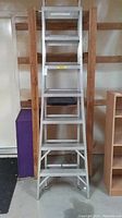 Front view of the aluminum ladder showing it in step ladder form.