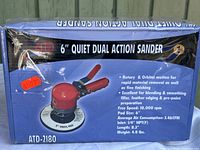 Box of new ATD 6-inch quiet dual action pneumatic sander featuring a photo of the tool and key specs.
