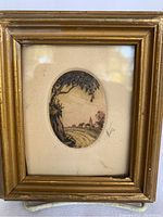 Full view of framed miniature coloured engraving showing the small oval print surrounded by mat with visible signatures and gold-toned plaster frame