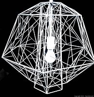 Close-up front view of the white metal geometric wireframe pendant light fixture with central bulb shown against a black background.