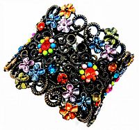 Photo showing the top view of the square brass cuff bracelet decorated with colorful enamel flowers and multi-colored beads.
